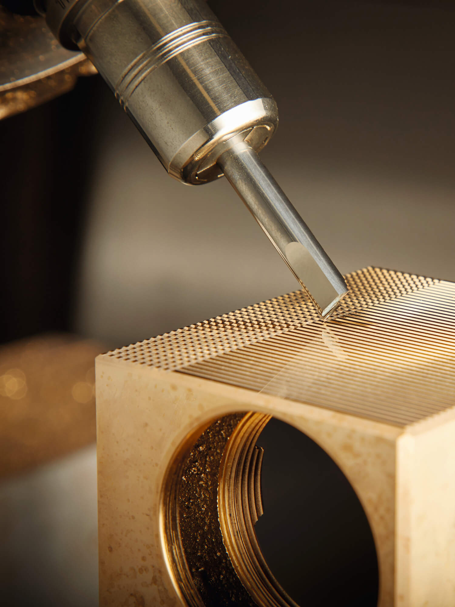 Diamond drilling machine on an AXOR Edge faucet