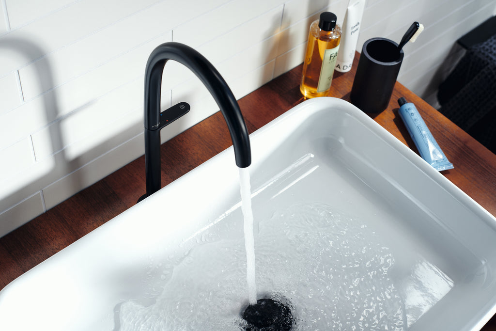 AXOR One Basin Mixer Faucet Select 260 with Push-Open Waste Set from Brandt in Matt Black finish