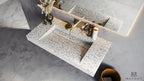 EDGE 90 cm Vegghengt Servant sett skrått ovenfra i Terrazzo White fra Brandt Bad med vegghengt servantbatteri BOX006 i Brushed Nickel fra Tapwell.